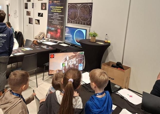 Kids playing at the Joseki booth